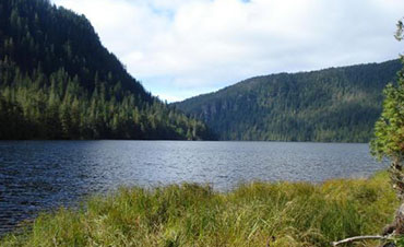 Shore of its namesake lake approximately 33 air miles northeast of Ketchikan